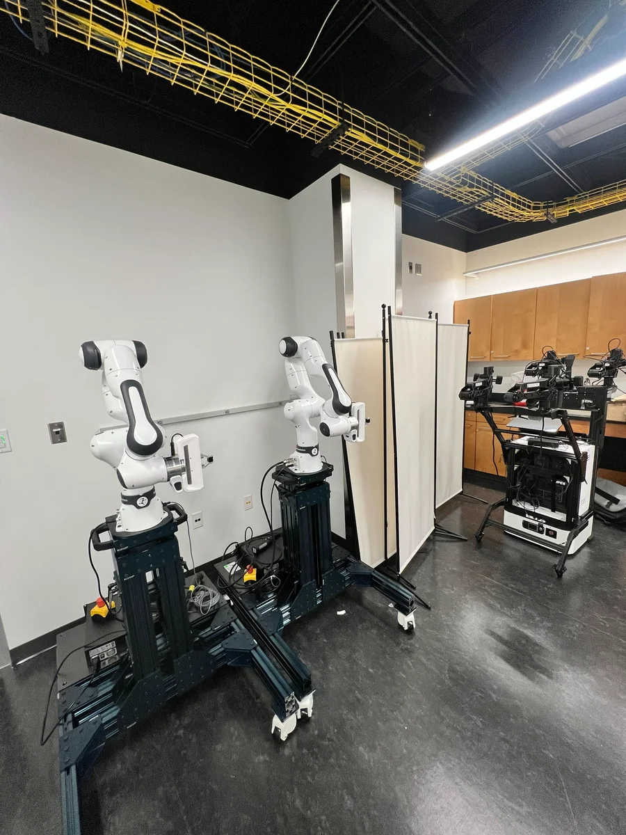 Two Franka Research 3 robot arms and mobile robot platforms in Furong Lab